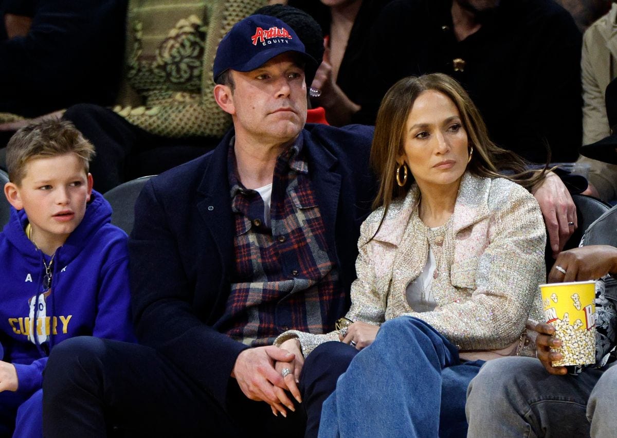 Jennifer Lopez, Ben Affleck and his son Samuel Garner Affleck attend a basketball game between the Los Angeles Lakers and Golden State Warriors on March 16, 2024 in Los Angeles