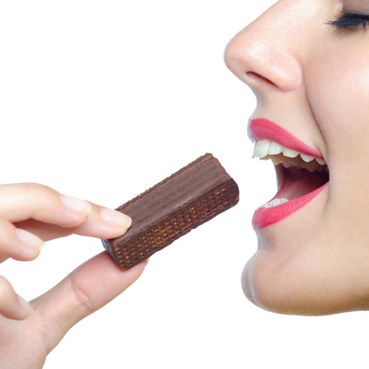 Person eating chocolate