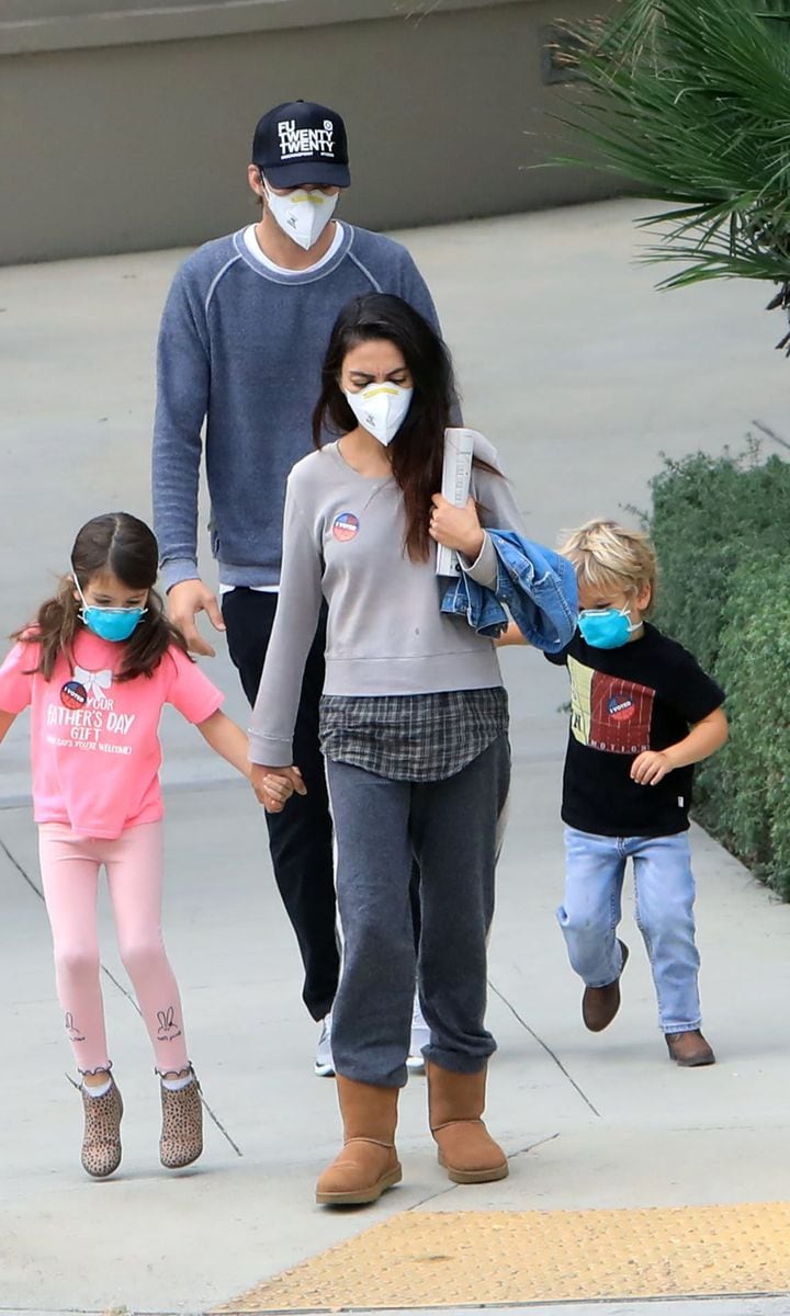 Mila Kunis and Ashton Kutcher voting