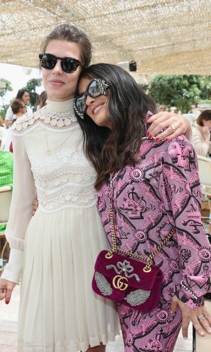 Charlotte Casiraghi and Salma Hayek shoulder