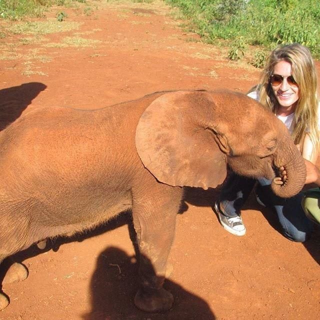 Gisele Bundchen with an elephant