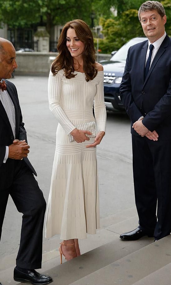 Kate Middleton in a white off the shoulder dress by Barbara Casasola