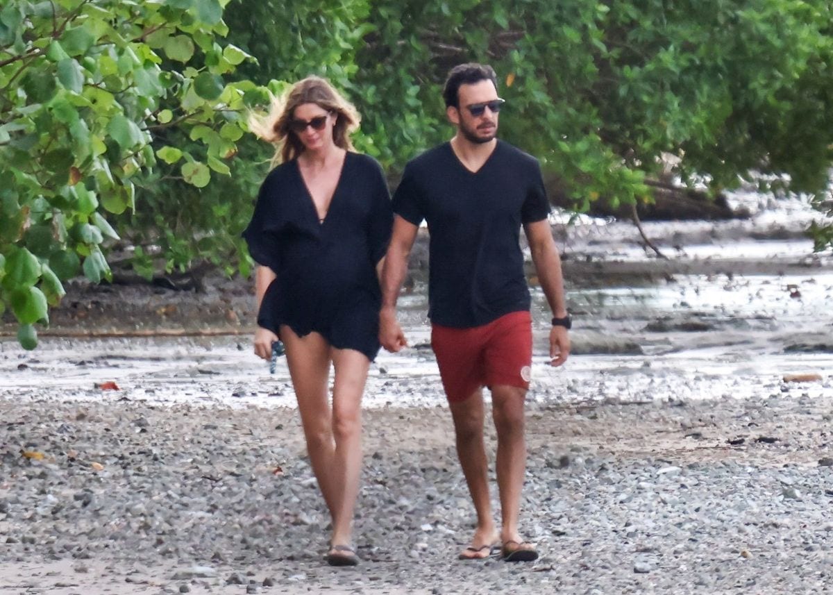 Watch Gisele Bündchen and Joaquim Valente enjoy their beach day with strolls and surfing