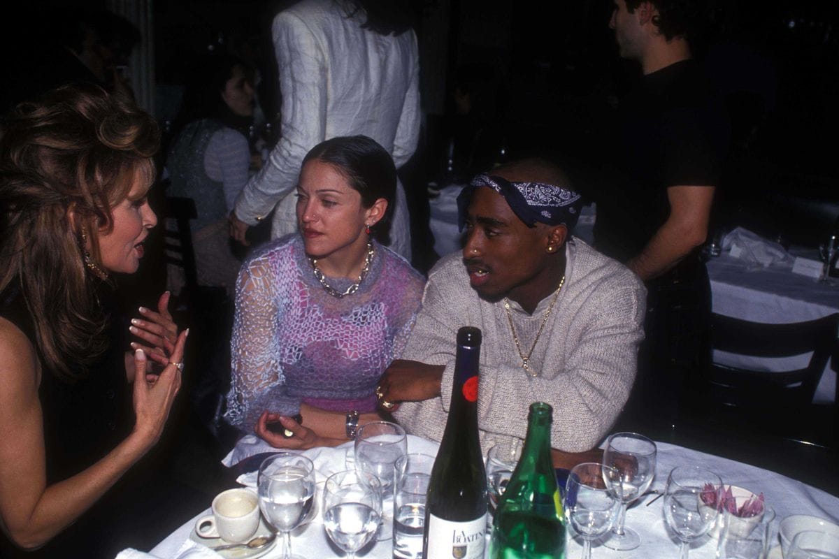 Madonna and Tupac speaking with Raquel Welch