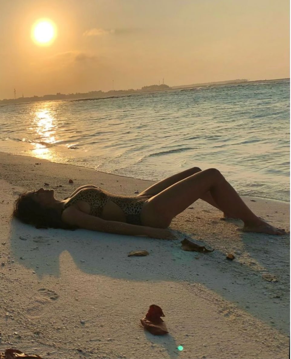 Salma Hayek posing by the beach 