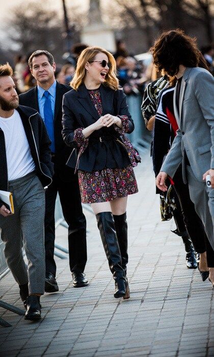 Emma Stone's smile radiated through the streets of Paris as she made her way into the Louis Vuitton presentation.
Photo: Getty Images