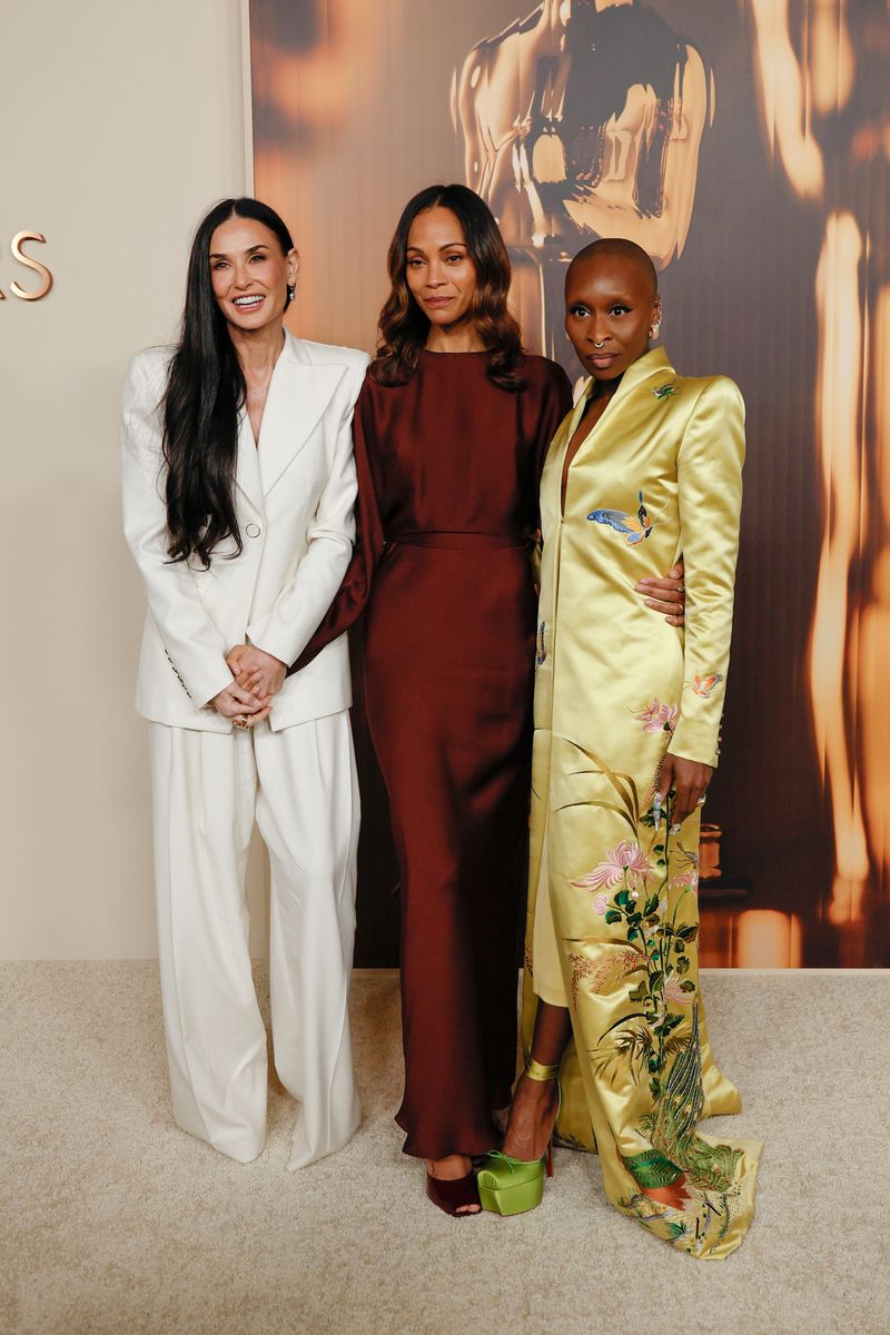 LOS ANGELES, CALIFORNIA - FEBRUARY 25: (L-R) Demi Moore, Zoe Saldana and Cynthia Erivo attend the 97th Annual Oscars Nominees Dinner at the Academy Museum of Motion Pictures on February 25, 2025 in Los Angeles, California. (Photo by Frazer Harrison/Getty Images)