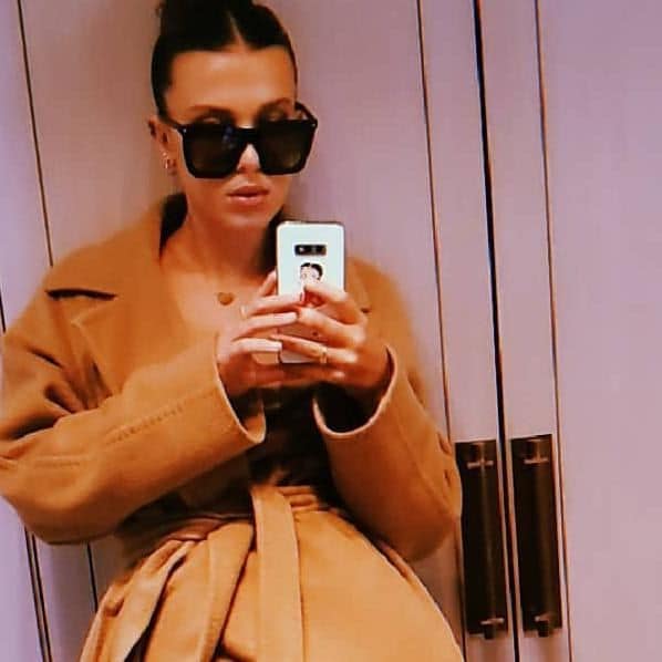 Millie Bobby Brown with sunglasses taking a selfie