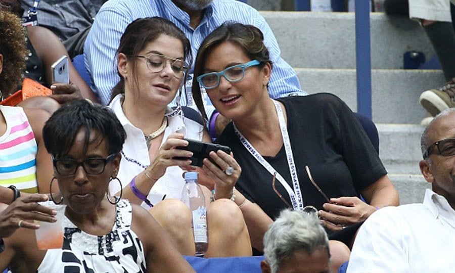 Debra Messing and Mariska Hargitay took a break from the match, grabbed their glasses and scrolled through some photos.
Photo: Jean Catuffe/GC Images