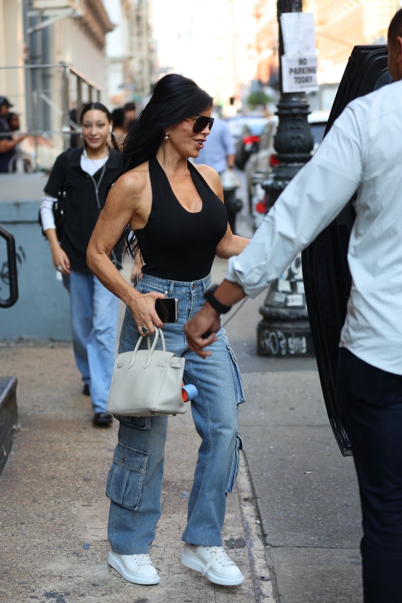 Lauren Sanchez turns heads as she steps out for a shopping trip with her son Nikko Gonzalez in Soho, New York