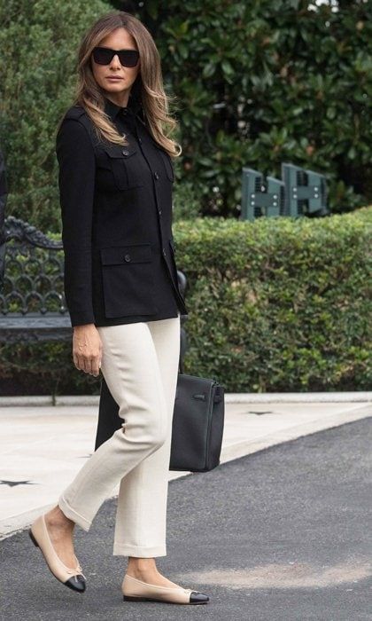 Barron Trump's mom stayed neutral on her way to Florida in Marine One in a structured black Ralph Lauren jacket and off-white capris. She paired the look with sophisticated Chanel ballet flats and a black leather Hermes Birkin bag.
Photo: Getty Images