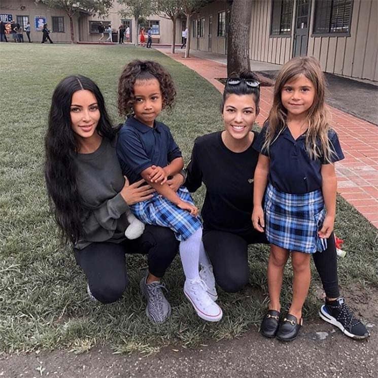 Kim and Kourtney Kardashian with kids