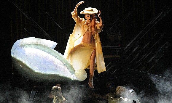 Always one to make an entrance Lady Gaga arrived at the 2011 Grammys ceremony concealed in a replica egg. When the egg 'hatched' on stage, Gaga emerged from the shell in a gold skirt, croped top and hat. <br>Photo: Getty Images