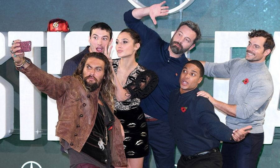 Jason Momoa made sure to get Ezra Miller, Gal Gadot, Ben Affleck, Ray Fisher and Henry Cavill into a silly selfie shot during the London photocall for <i>Justice League</i>.
Photo: WireImage
