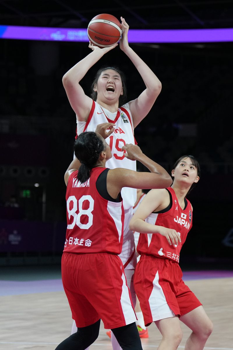 Zhang Ziyu of China in action during the FIBA U18 Women's Asia Cup 2024 match between China and Japan on June 26, 2024, in Shenzhen, China.