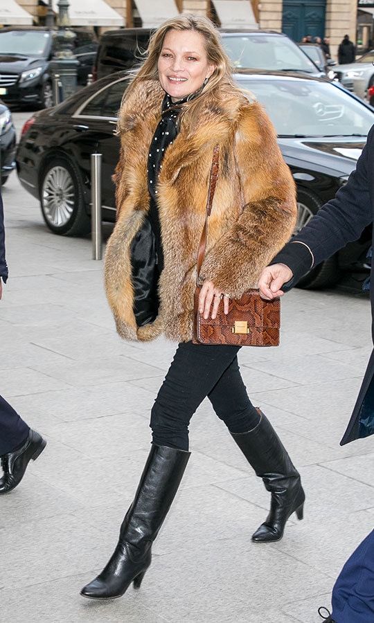 Legendary supermodel Kate Moss was spotted out and about wearing a fur jacket and heeled knee-boots in Paris during fashion week.
Photo: Getty Images