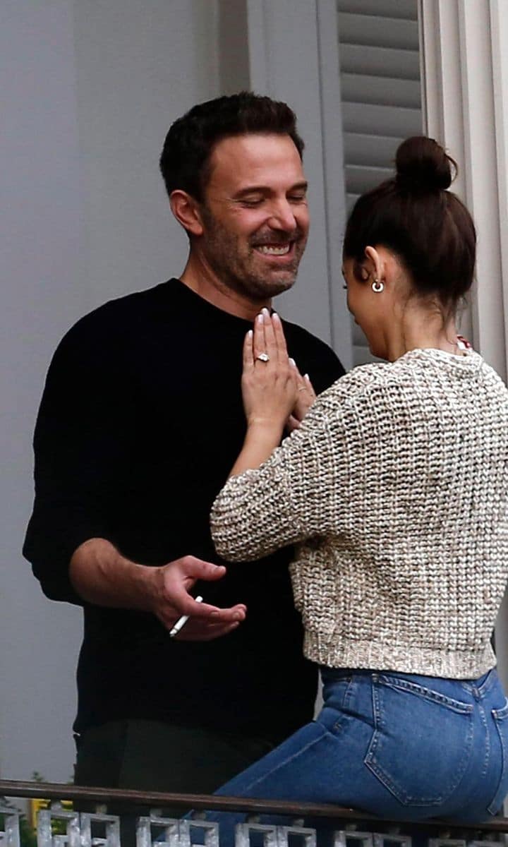 Ben Affleck and Ana de Armas on a balcony.