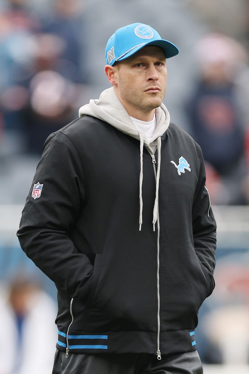 CHICAGO, ILLINOIS - DECEMBER 22: Offensive coordinator Ben Johnson of the Detroit Lions looks on prior to the game against the Chicago Bears at Soldier Field on December 22, 2024 in Chicago, Illinois. (Photo by Michael Reaves/Getty Images)