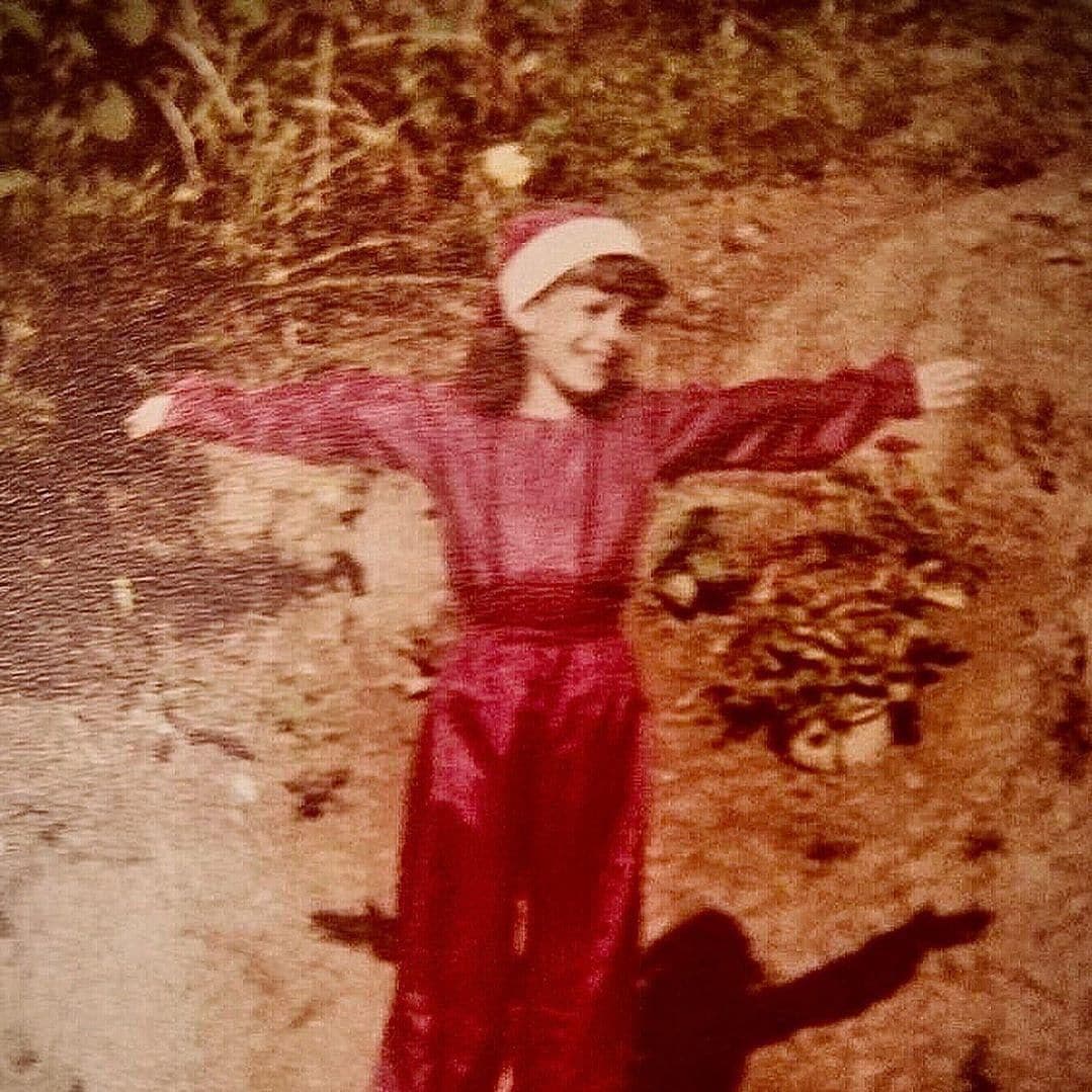 Dayanara Torres as a child posing in Santa Claus outfit