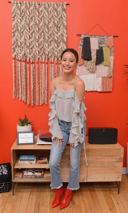 Was it planned? Jamie Chung's booties matched the colorful wall at the WeWork Congress. The actress was in town promoting <i>1985</i>.
Photo: Getty Images