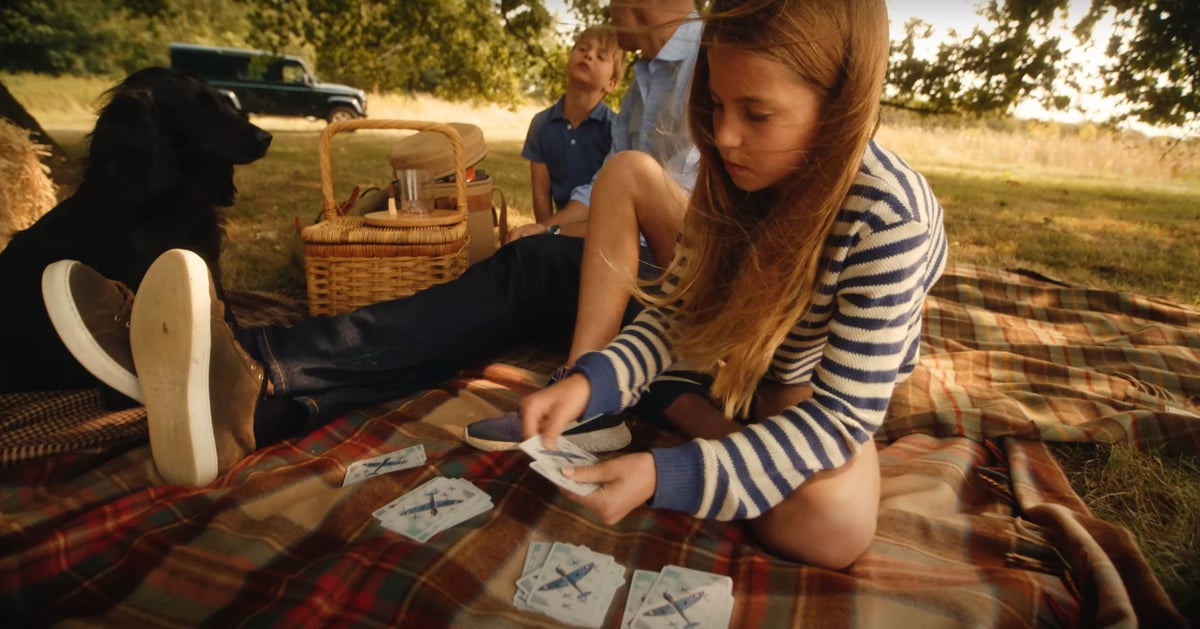 Princess Charlotte playing with cards