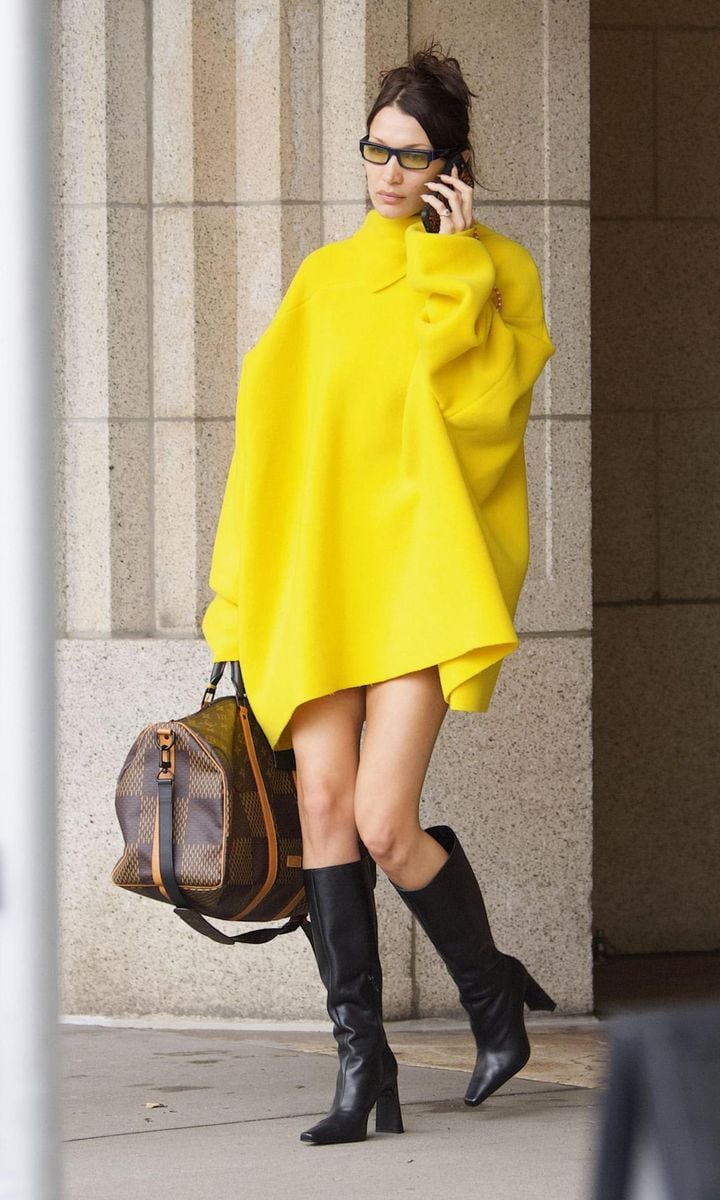 Bella Hadid Begins her Day in NY with a Vibrant Yellow Sweater Poncho