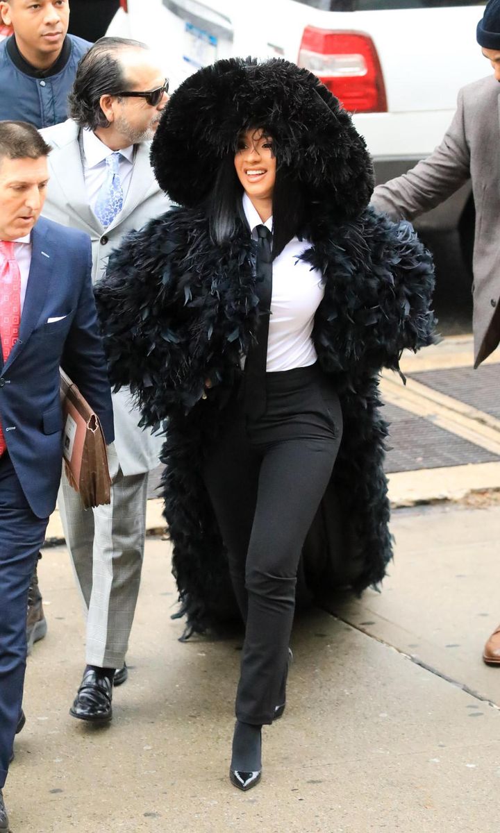 Cardi B courthouse feather outfit
