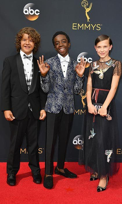 Millie stole the show with her equally stylish <I>Stranger Things</I> co-stars, Gaten Matarazzo and Caleb McLaughlin, at the 68th Annual Primetime Emmy Awards in Los Angeles. The 12-year-old wore a black Red Valentino gown with a bird motif, accessorized with a personalized clutch and chunky heels.
Photo by Steve Granitz/WireImage