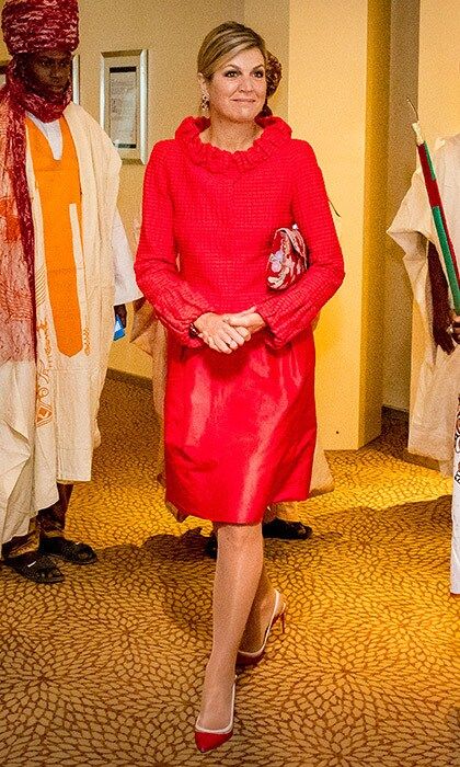 Another bright creation from one of the Dutch Queen's favorites, Natan! Maxima wore this ensemble on day 3 of her Nigeria visit, as she attended the Enhancing Financial Innovation and Access conference, where she was set to speak.
Photo: Patrick van Katwijk/Getty Images