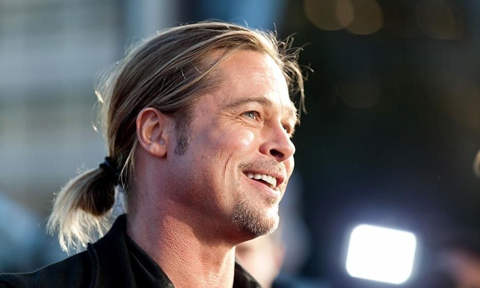 It all started in 1994, when <a href="https://us.hellomagazine.com/tags/1/brad-pitt/"><strong>Brad Pitt</strong></a> played a tender-hearted vampire with a sleek, straight 'tail.' Between roles, the superstar has debuted every incarnation of a bun and pony, including this messy number at the <i>World War Z</i> premiere in Australia.
<br>
Photo: Getty Images