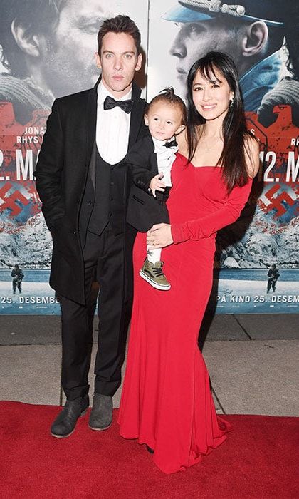 Jonathan Rhys Meyers' baby son Wolf made his red carpet debut on December 18, sharing the spotlight with his actor dad and mom at the <I>12th Man</I> premiere in Norway. Dressed in a tiny tuxedo, the one-year-old perfectly matched his Hollywood star dad.
Photo: