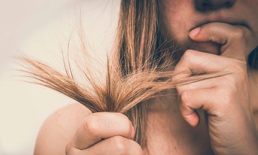 Woman looking at her ends