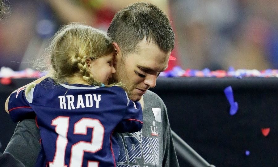Brady's little lady! Tom Brady's daughter Vivian held on to her Super Bowl winning father after Super Bowl LI in Houston.
Photo: Jamie Squire/Getty Images
