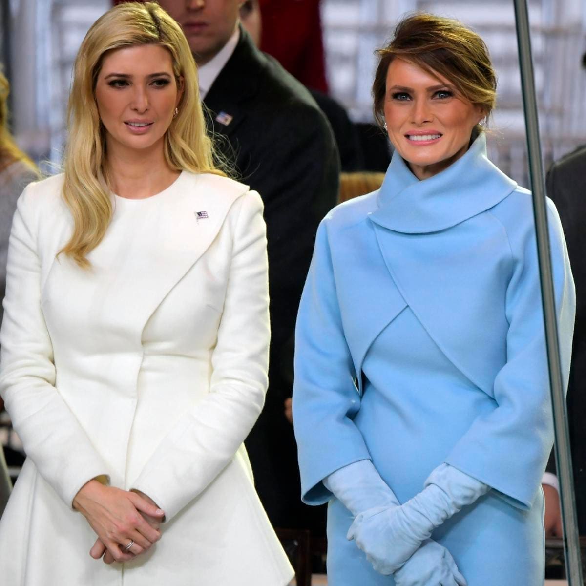 Newly sworn in President Donald Trump with his wife Melania walk down Pennsylvania Avenue in front of the White House