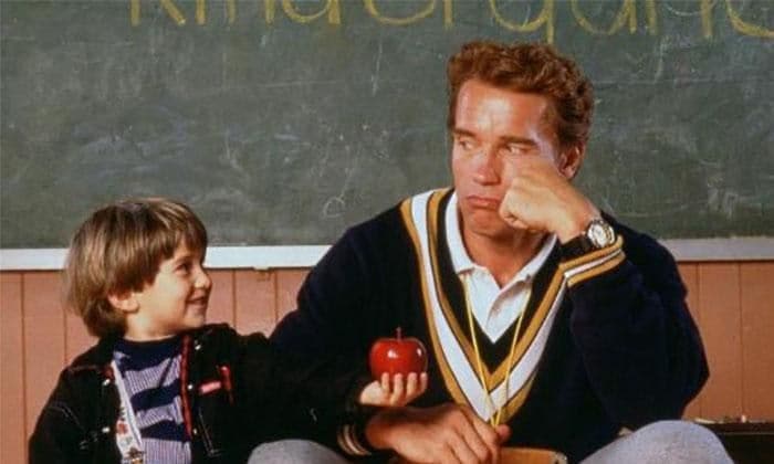 Arnold Schwarzenegger as Detective Kimble in Kindergarten Cop