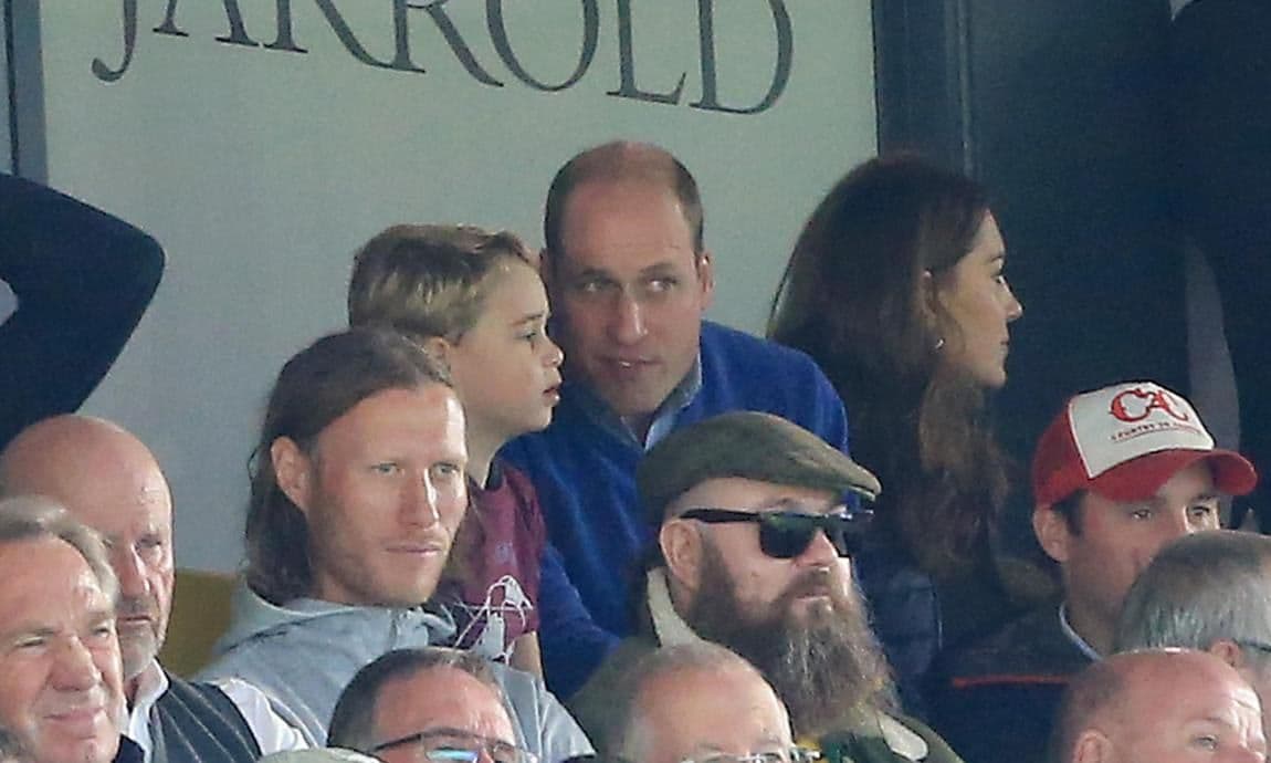 Prince George of Cambridge speaks to Prince William, Duke of Cambridge during the Premier League match between Norwich City and Aston Villa at Carrow Road on October 05, 2019 in Norwich, United Kingdom.