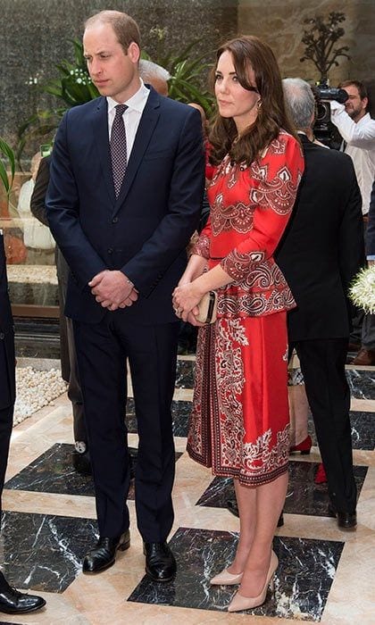 Upon her arrival to the Taj Mahal Palace Hotel, Duchess Kate went for a red patterned Alexander McQueen dress with nude L.K.Bennett heels and topped the look off with a gold Russell & Bromley clutch.
<br>
Photo: Getty Images