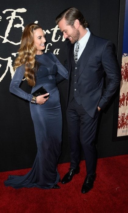 September 21: Armie Hammer was absolutely smitten by his wife Elizabeth Chambers as she showed off her growing baby bump in a J. Mendel gown during the premiere of <i>The Birth of a Nation</i> in Hollywood.
Photo:
