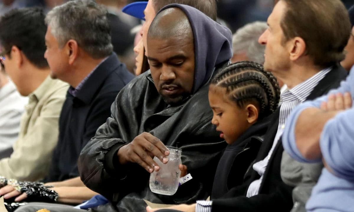 Kanye West and son watch game with Golden State Warriors co owners