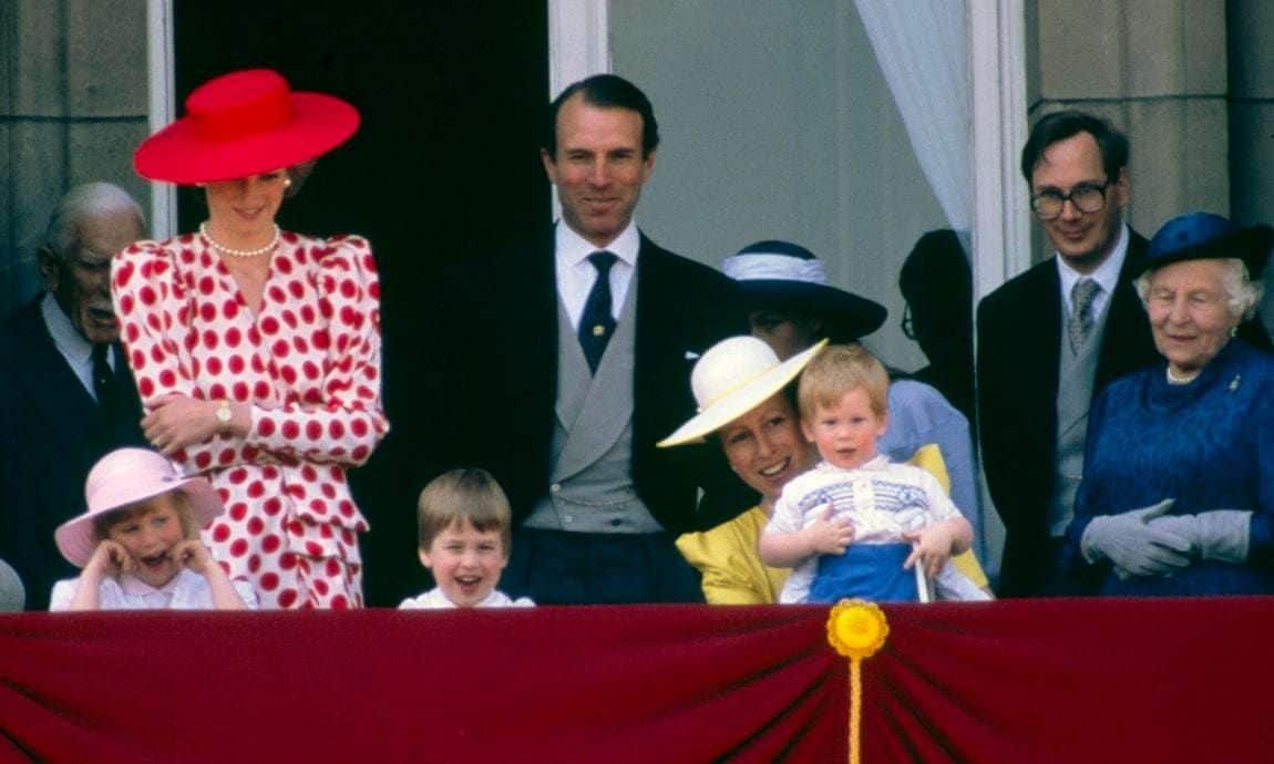 Princess Anne gave her nephew Prince Harry a lift to look over the balcony, while little William smiled at the crowd next to his cousin Zara.