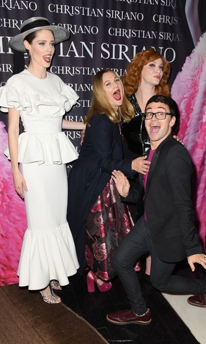 Forget Charlie, it was all about Christian Siriano's Angels at his <i>Dresses to Dream About</i> book party at the Rizzoli Flagship Store in NYC. Coco Rocha, Drew Barrymore and Christina Hendricks came out to support the designer at the Belvedere Vodka-sponsored bash.
Photo: Getty Images