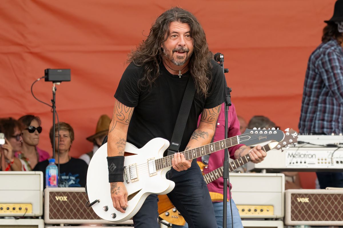 Dave Grohl performs with Foo Fighters on Day 6 on April 28, 2024, without a ring 