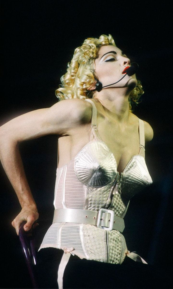 Madonna’s Blonde Ambition Tour at the Feyenoord Stadion, De Kuip, Rotterdam, Holland, in 1990. She is wearing a Jean Paul Gaultier conical bra corset.