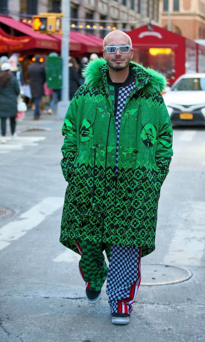 J Balvin Rocks a Green Louis Vuitton Wax Fishtail Parka while Out in Soho NY