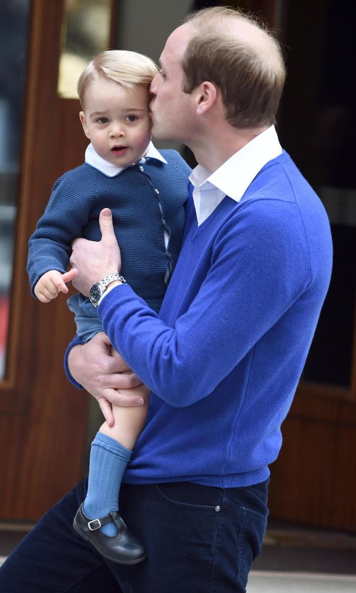 William planted a kiss on his firstborn's head before heading into the Lindo Wing so George could meet his sister little Princess Charlotte for the first time in 2015.