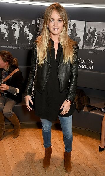 Prince Harry's actress ex Cressida Bonas picked a foolproof combination boots, jeans, a black blouse and chain handbag with her jacket at the 'Dior by Avedon' book launch in Paris, France. <br>
Photo: Getty Images