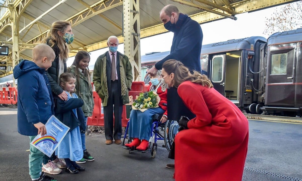 The second stop of the day was a visit to Bath. At the train station, Prince William and Kate chatted with five-year-old Jasmine Warner, whose brother Otto (left) came out of cancer treatment that same day.