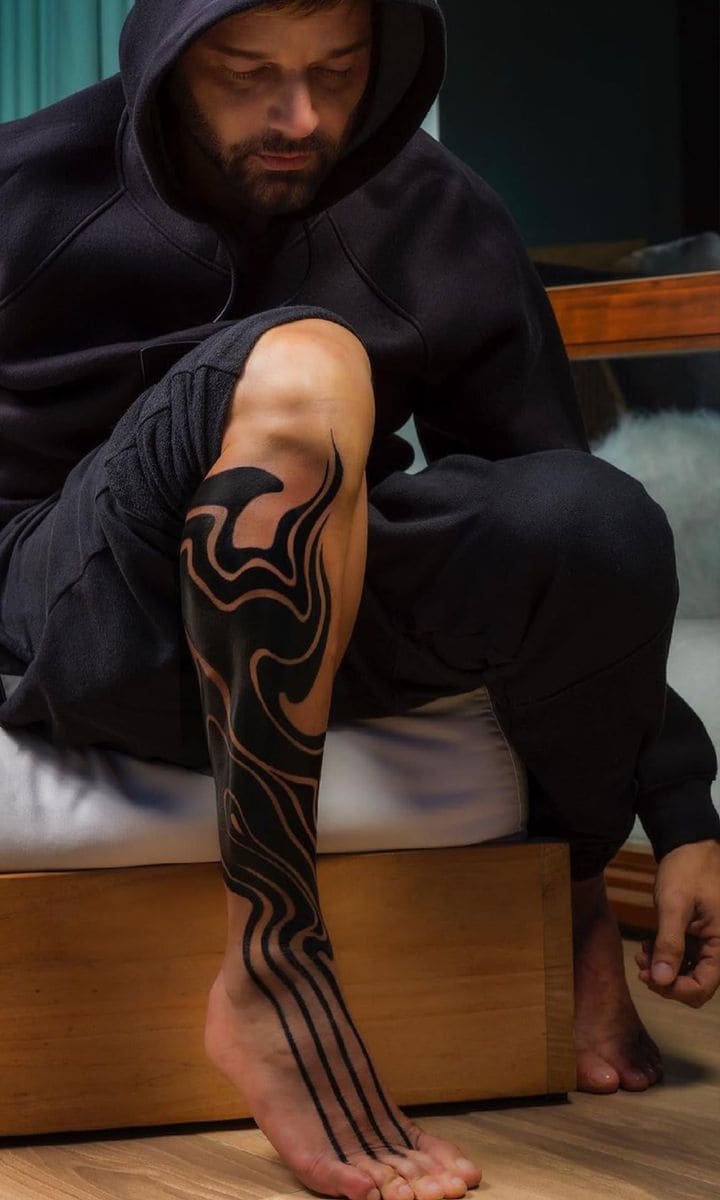 Ricky Martin Leg Tattoo