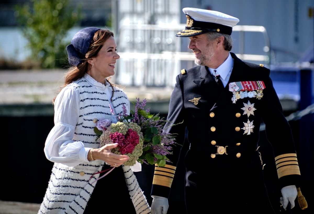 King Frederik X of Denmark (R) and Queen Mary of Denmark react as they arrive at the port of Rönne for their visit to Bornholm Regional Municipality on the Danish island of Bornholm in the Baltic Sea on August 19, 2024. (Photo by Pelle Rink/Ritzau Scanpix/AFP) / Denmark OUT (Photo by PELLE RINK/Ritzau Scanpix/AFP via Getty Images)