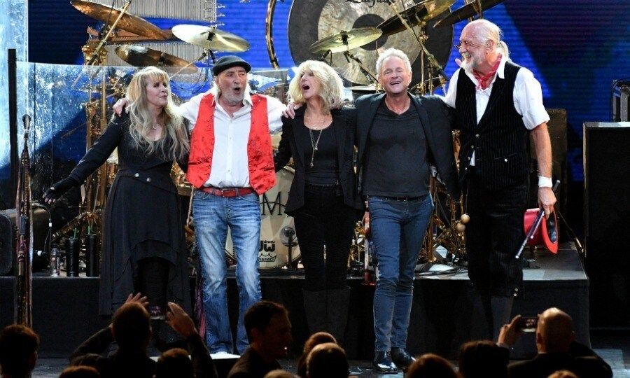 Miley was among many stars to attend the evening, which honored music legends Fleetwood Mac. Other stars included: Harry Styles, Jared Leto, Keith Urban and Lorde. Pictured here, honorees: Stevie Nicks, John McVie, Christine McVie, Lindsey Buckingham and Mick Fleetwood perform onstage after being honored with the "Person of the Year" title.
Photo: Getty Images